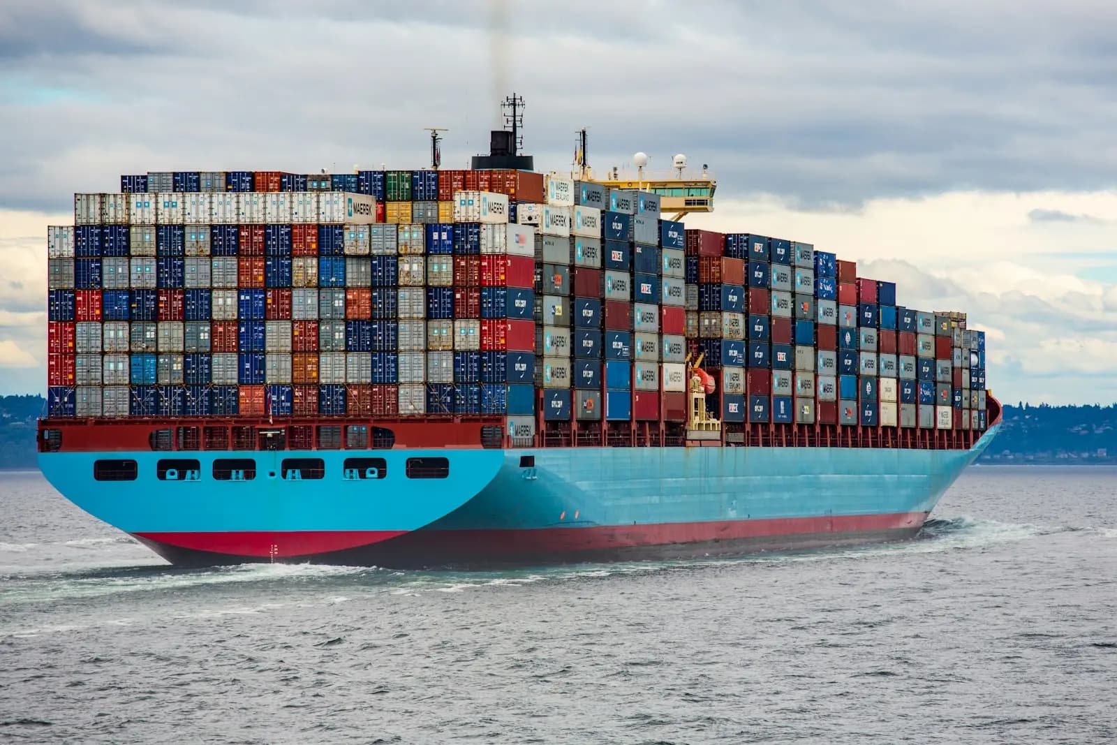 Container ship at sea loaded with cargo containers